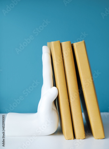 White hand shaped bookend h...