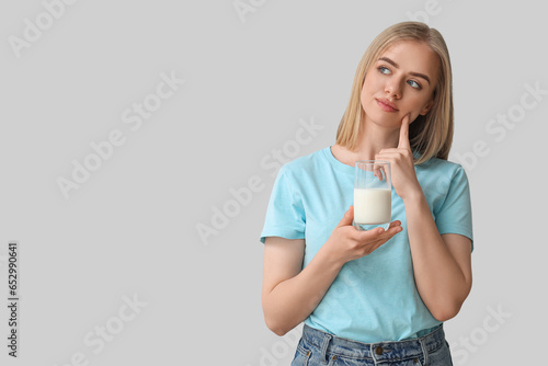 Thoughtful young woman with...