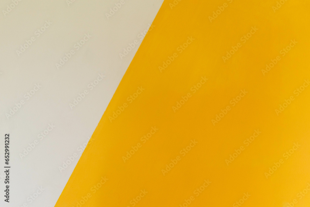 White and yellow diagonally divided background copy space White and yellow diagonally divided background copy space