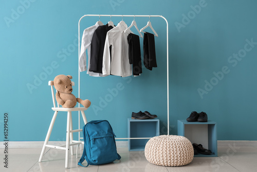 Stylish school uniform hang...