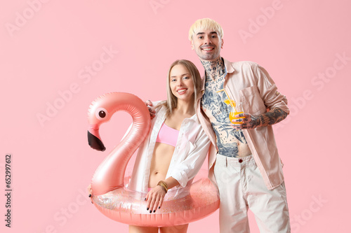 Young couple with inflatabl...
