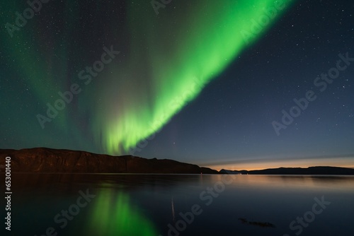 Northern Lights also known as Aurora Borealis over Scandinavia in Northern Norway