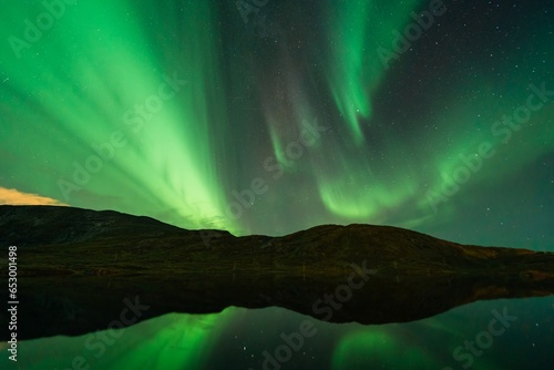 Northern Lights also known as Aurora Borealis over Scandinavia in Northern Norway