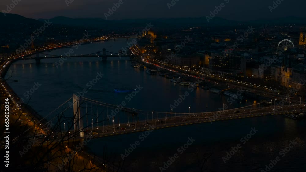 Famous budapest bridges taken by night. A famous place of Budapest city with chain bridge with street illumination against nightfall sky. Famous budapest bridges taken by night. A famous place of Budapest city with chain bridge with street illumination against nightfall sky.