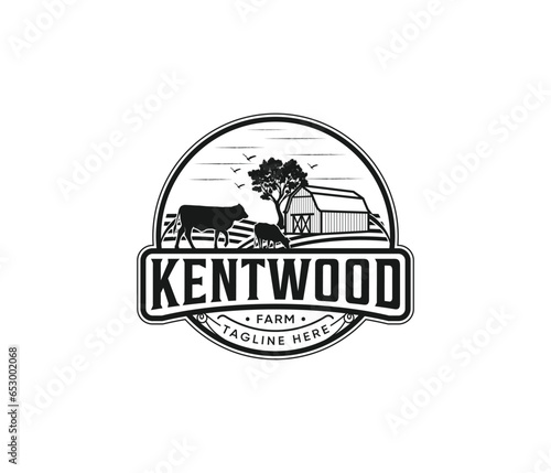 Old farm barn logo, cow farm logos complete with lush cow vectors and grasses photo