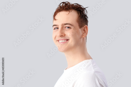 Young man with wet hair on ...