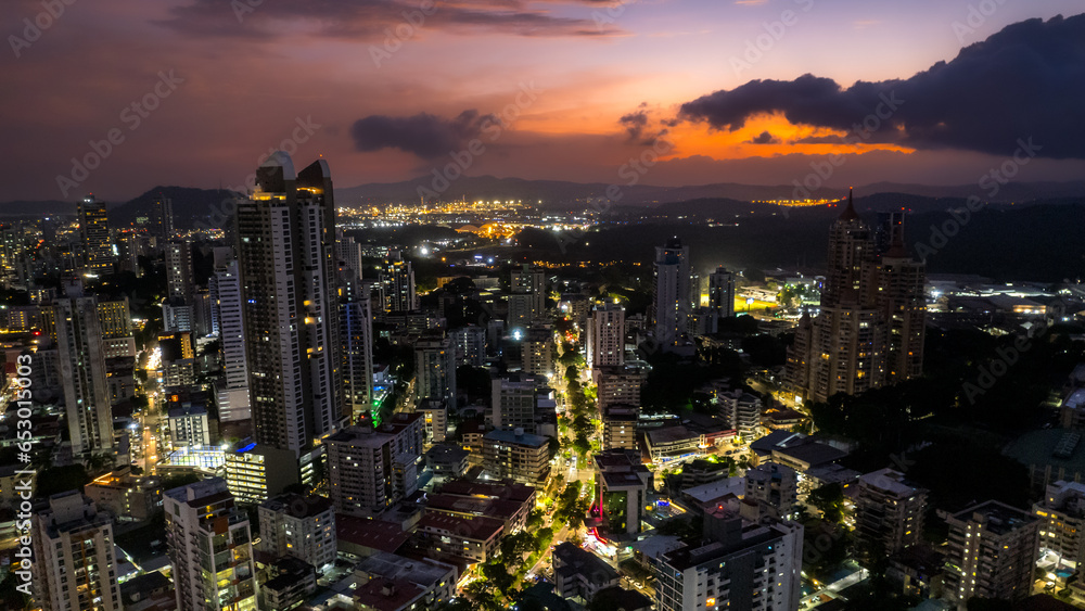 Beautiful aerial view of Panama City, its skyscraper buildings, the Cinta Costera at Sunset