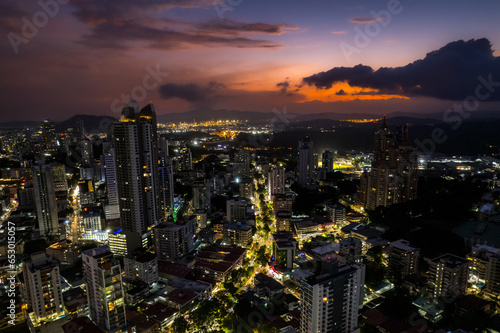 Beautiful aerial view of Panama City  its skyscraper buildings  the Cinta Costera at Sunset
