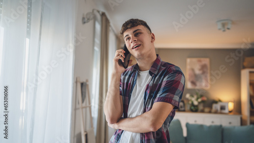One man caucasian male teenager boy use mobile phone smartphone