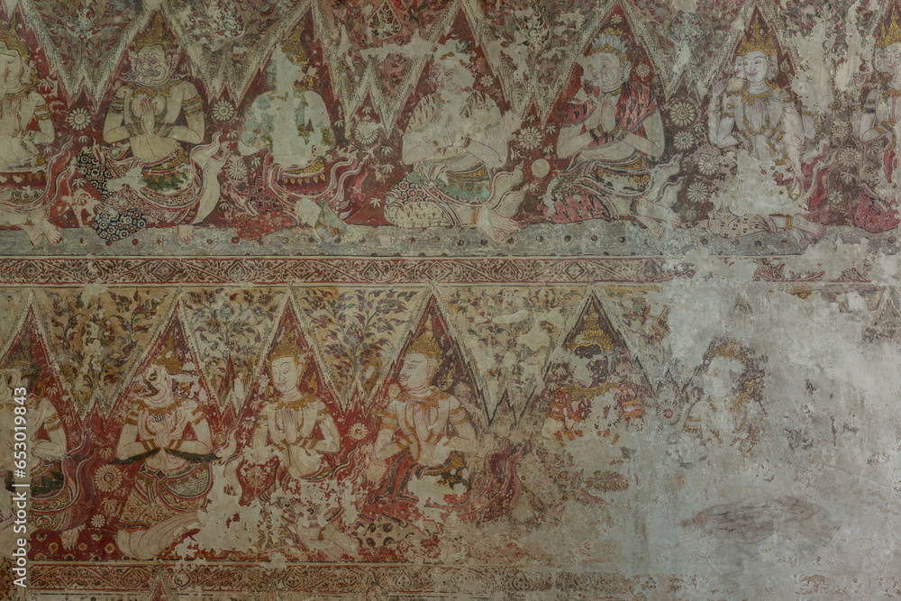 The ancient thai art mural (wall paintiing) damage around inside of thai church at Wat yai suwannaram temple. Old and damaged over time, Selective focus.