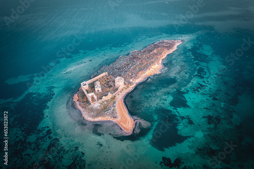 Aerial photo of the island in the middle of the sea © Aytug Bayer