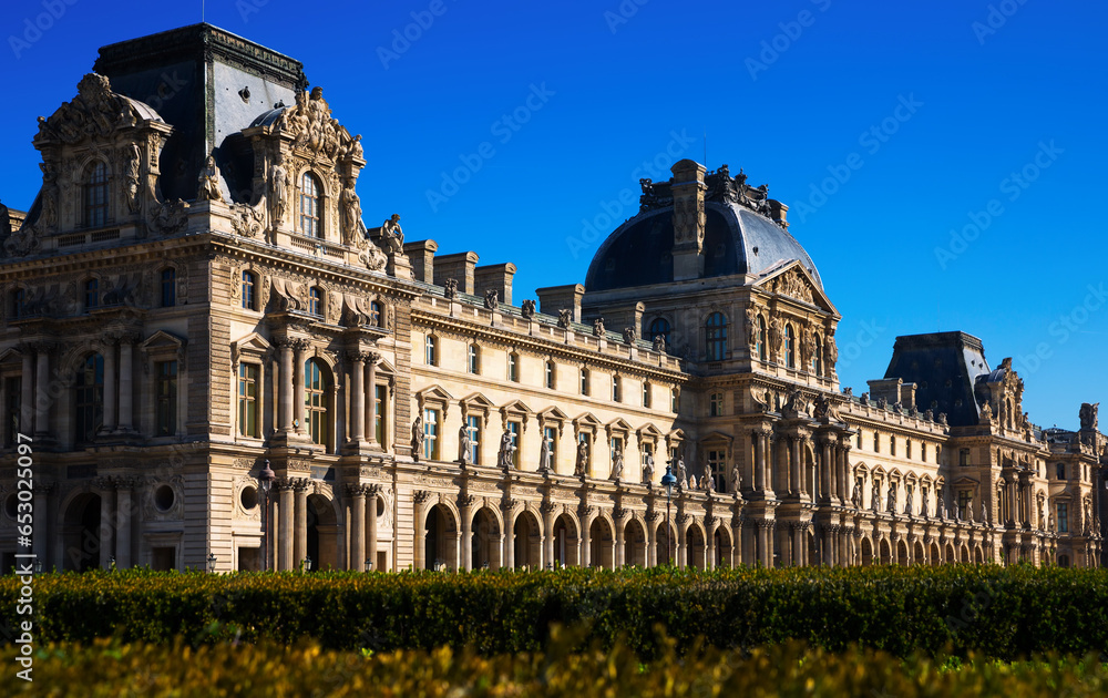 Majestic architecture of famous Louvre palace. View of building fragment from main entrance