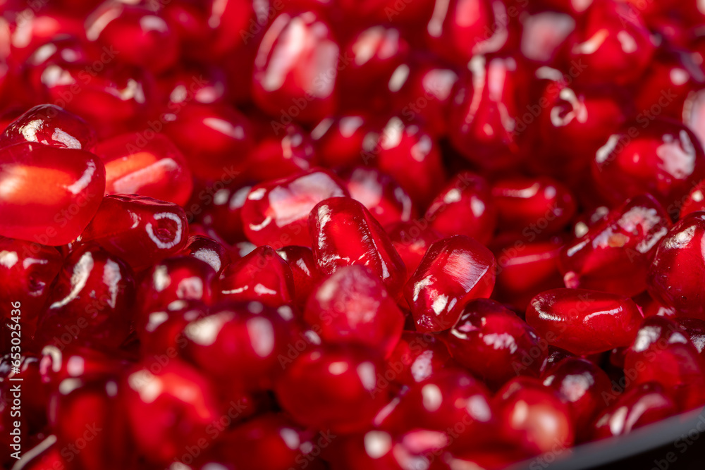 Grains of red ripe pomegranate close up Grains of red ripe pomegranate close up