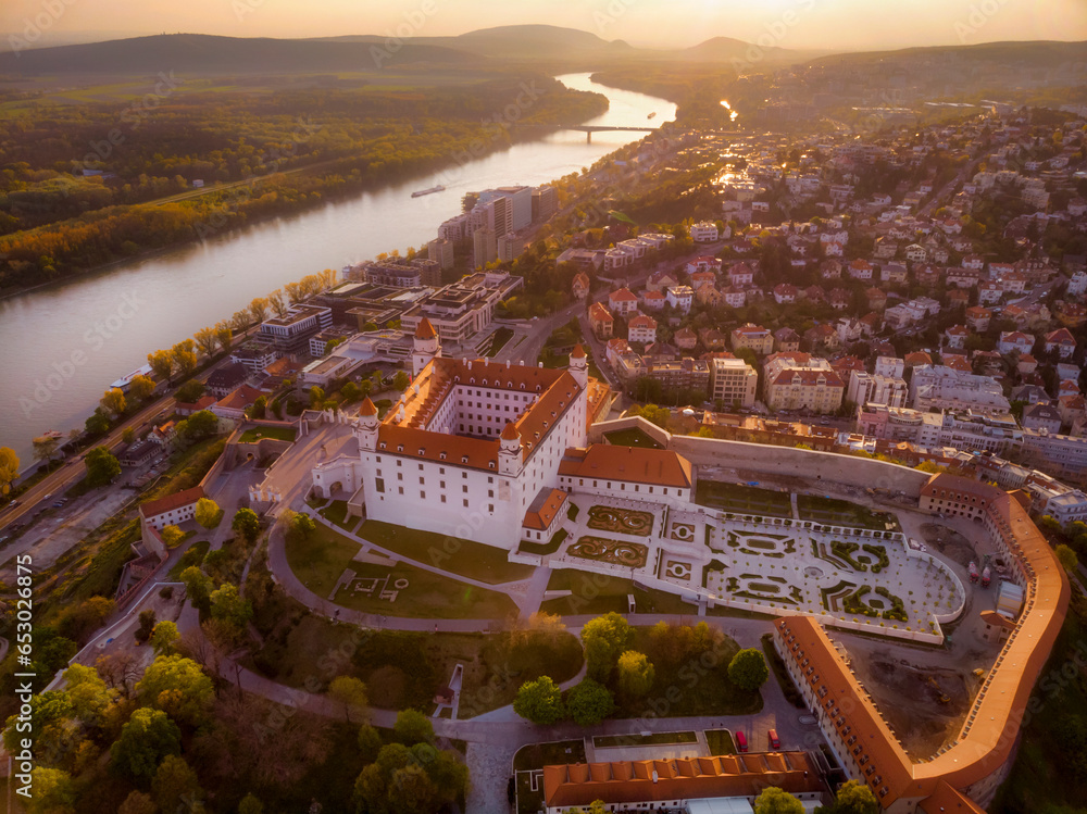 aerial photos of bratislava castle with sunset colors