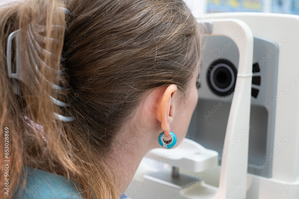 the patient measures visual acuity in an electronic device for