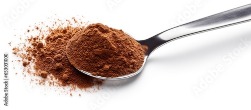 Dispensing instant coffee or coffee powder with a stainless teaspoon on a white background photo