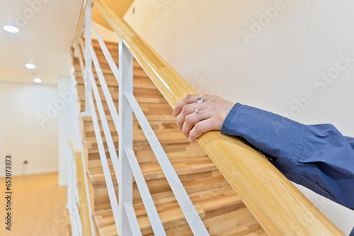 When going up the stairs, you must hold on to the handrail. Elderly people may fall, so be careful