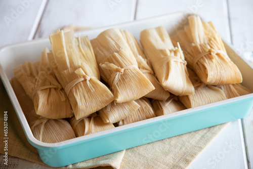 Fresh homemade tamales in a turquoise pan