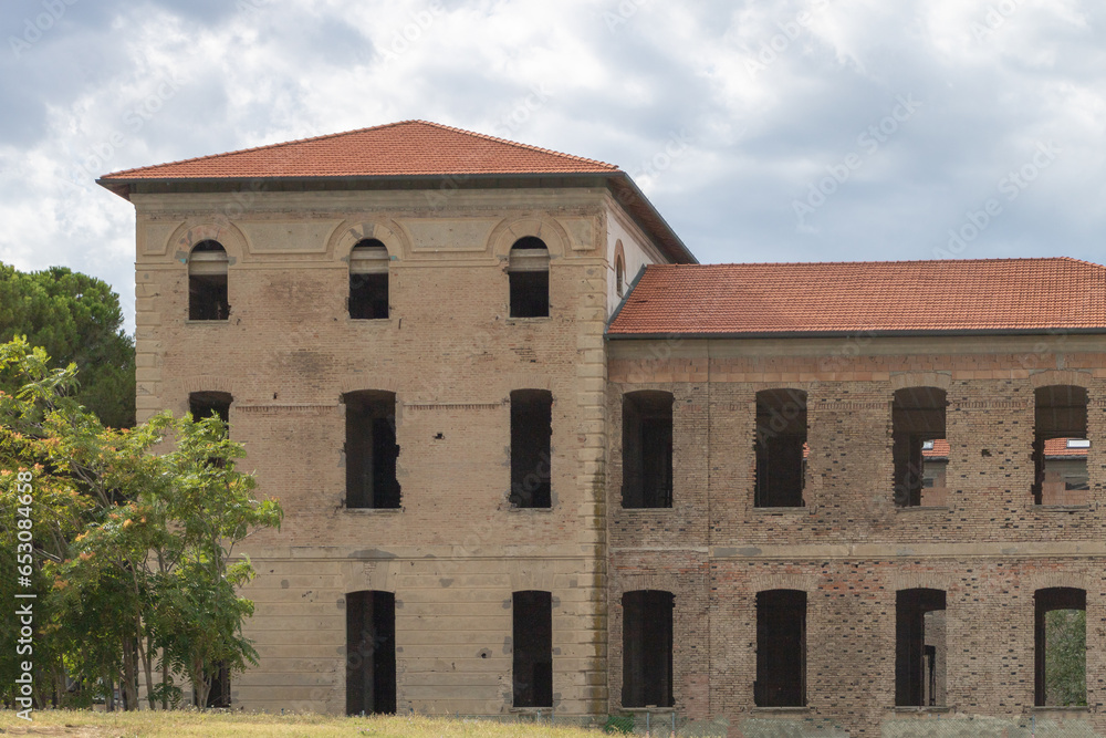 An old brick building with a red roof in Rimni Italy An old brick building with a red roof in Rimni Italy