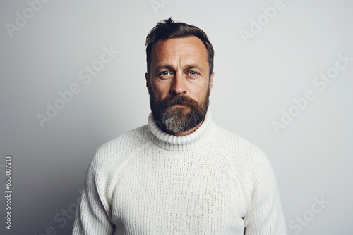 Russian man wearing a cozy sweater.