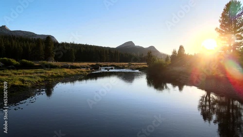Drone view of reflective river at sunset in Yosemite 