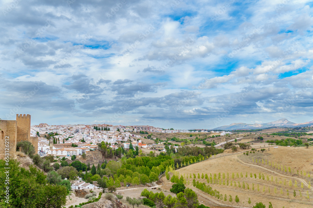 panoramic view of the city of Ronda,Spain with the defensive walls in the foreground ,white villages of Andalusia