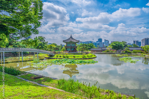 View of the water hall Hyangwonjeong with pool
Green in the palace. View of Gyeongbokgung Palace in summer, Seoul, South Korea.
A historical attraction popular with tourists and photographers.