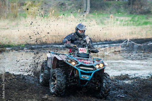 ATV, buggy, quad and UTV offroad vehicle rally in dust with mud splash. Extreme, adrenalin. 4x4