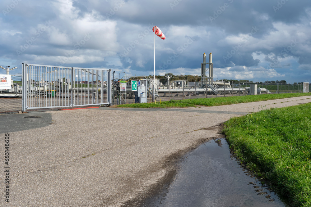 Gas installation in Moddergat Friesland. The Nederlandse Aardolie Maatschappij or NAM extracts natural gas from under nature reserve The Wadden Sea.