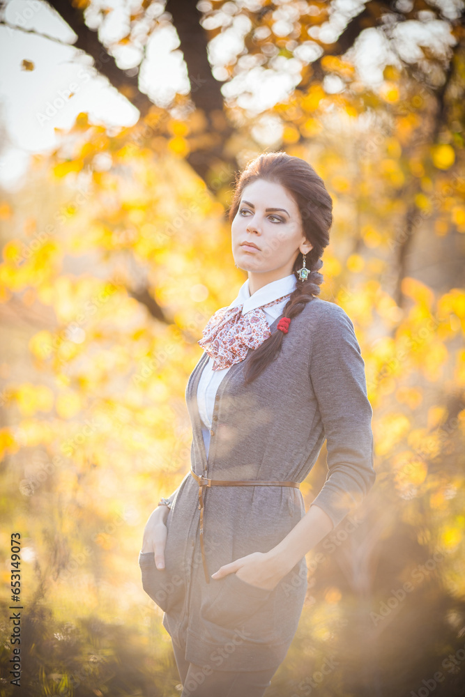 Cute smiley woman holding autumn leafs in the nature. Cute smiley woman holding autumn leafs in the nature.