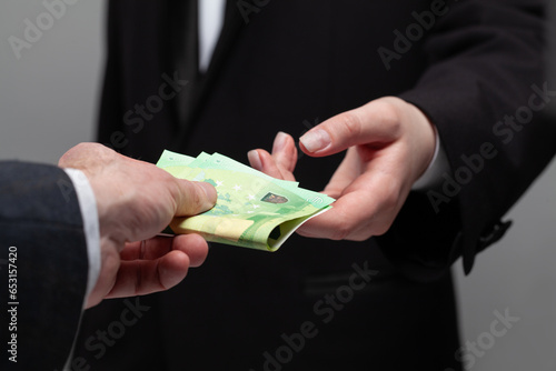 Wallpaper Mural Money cash euro banknote in human hand. Deal, salary and credit concept Torontodigital.ca