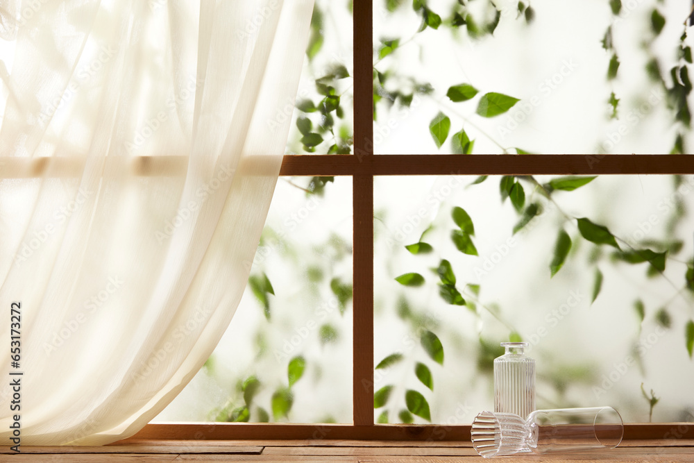 A window view of green leaves in the afternoon
sunlight. A window view of green leaves in the afternoon
sunlight.