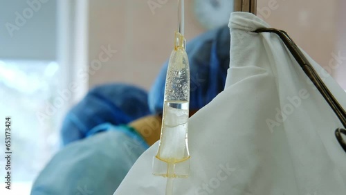 Medical dropper close-up for injection of intravenous solutions, vitamins, medicines. Anesthesia in the hospital. 