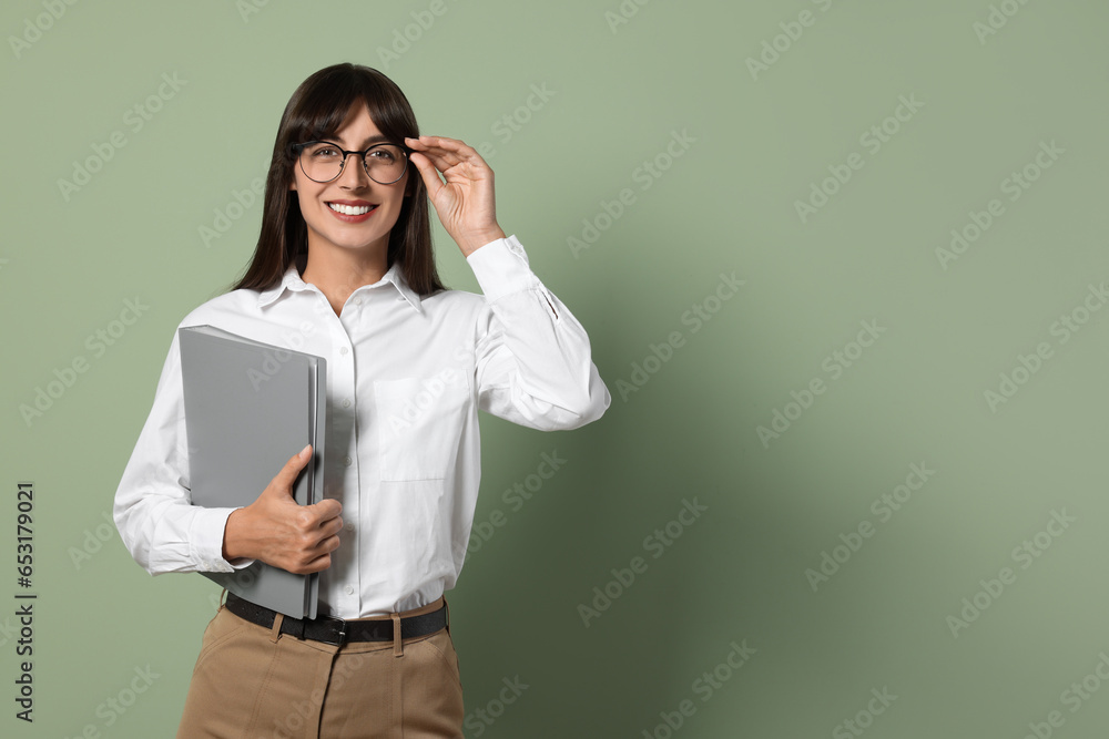 Happy secretary with folder on light olive background. Space for text Happy secretary with folder on light olive background. Space for text