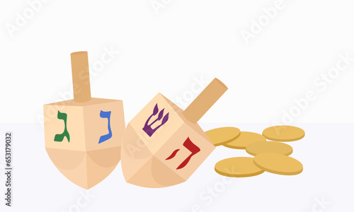 dreidel, sevivon - four-sided top with which children play during the Jewish holiday of Hanukkah. Two wooden tops and gold coins isolated on white background