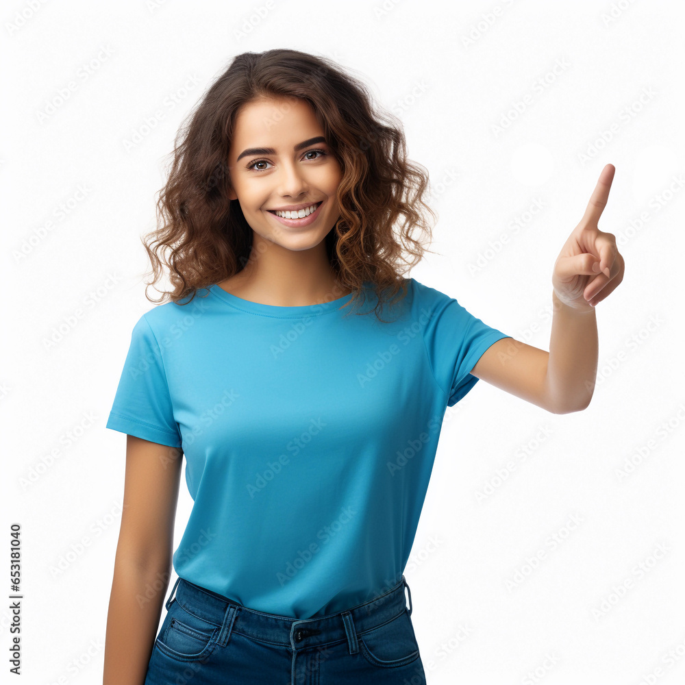 woman showing thumbs up: smiling girl in blue t-shirt with curly hair, pointing her finger, isolated on a white background woman showing thumbs up: smiling girl in blue t-shirt with curly hair, pointing her finger, isolated on a white background