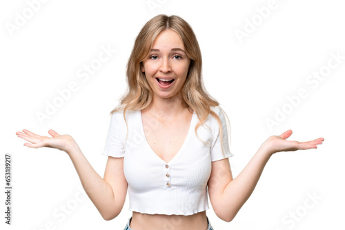 Young English woman over isolated background with shocked facial expression