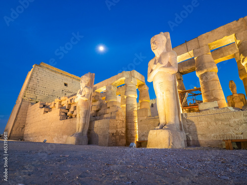 The Luxor Temple at night, under a full moon, constructed approximately 1400 BCE, UNESCO World Heritage Site, Luxor, Thebes photo