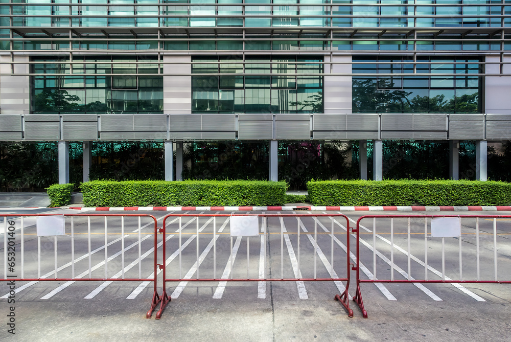 No entry in the modern office building. The restricted area with traffic steel barricades type without wheels.