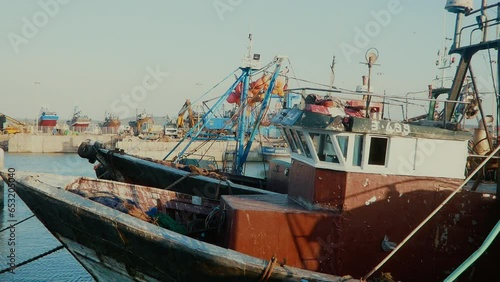 The famous fishing boats anchored at Essaouira harbour on the Atlantic Ocean in Morocco. High quality FullHD footage