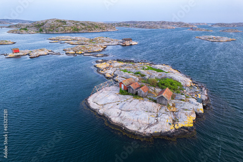 Wooden cottages on rocky islands at dusk, aerial view, Bohuslan, Vastra Gotaland, West Sweden, Sweden, Scandinavia photo