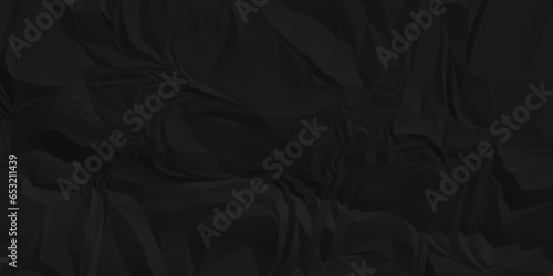 Dark crumple black fabric paper wrinkled poster template ,blank glued creased paper texture background. black paper crumpled backdrop background. used for cardboard and clarkboard.