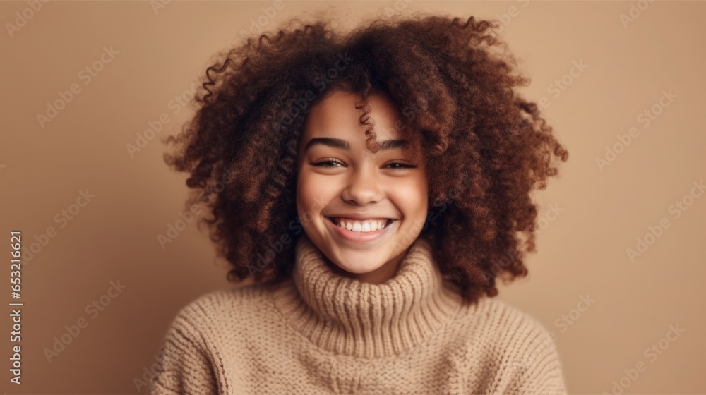A teenage girl's laughter lights up the frame as she poses against a clean, light studio setting. A teenage girl's laughter lights up the frame as she poses against a clean, light studio setting.
