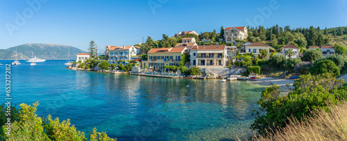 View of hotels overlooking Fiscardo harbour, Fiscardo, Kefalonia, Ionian Islands, Greek Islands photo