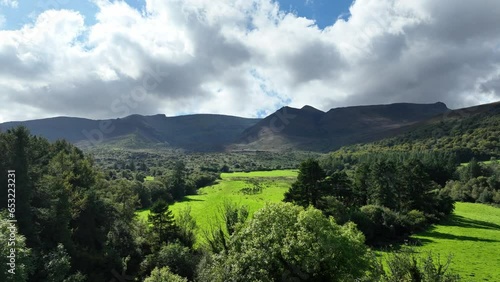 Comeragh Mountains Waterford aerial flying to the mountains over green pastures summer evening photo