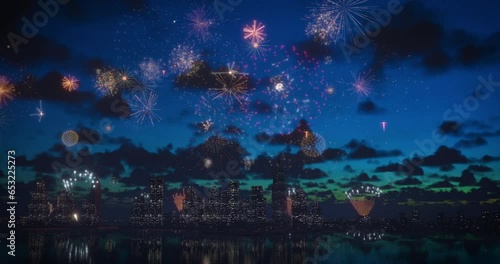 Brightly colorful fireworks in big city for New Years, Christmas, wedding and other events celebration on blue dark sky. 4k
