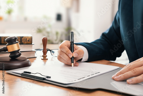 Notary public or lawyer working in the office photo