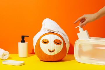 Pumpkin with face mask and skin care products