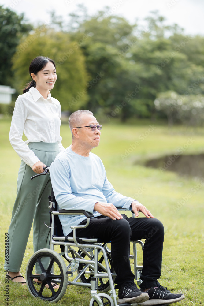 Helpful volunteers caring for elderly men at home health care. Helpful volunteers caring for elderly men at home health care.