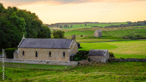 St Mary's Church and Tithe Barn at Swinburn, located at Great Swinburne in Northumberland the Barn is Grade II Listed and used in the Middle Ages to store farmers contribution to sustain local clergy photo